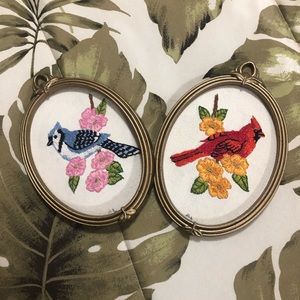 Hand cross stitched birds